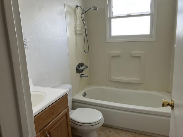 full bathroom featuring toilet, vanity, and  shower combination