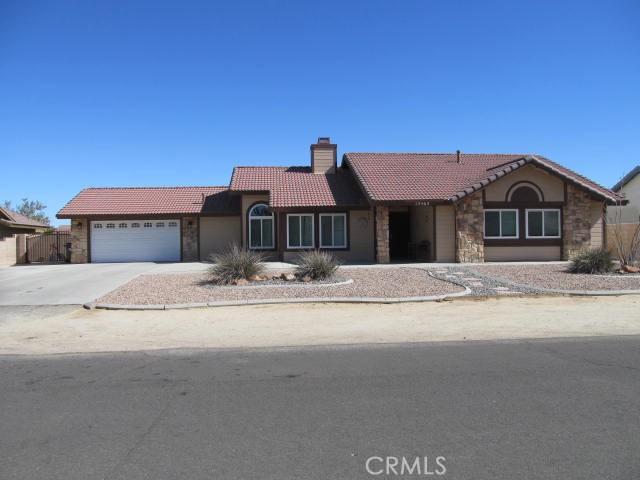 ranch-style home with a garage