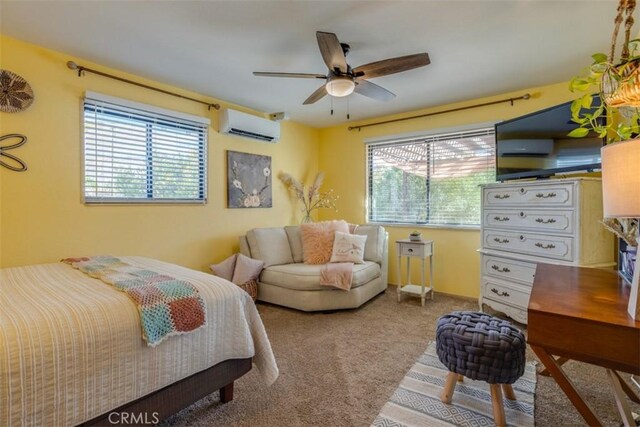 carpeted bedroom featuring a wall unit AC, multiple windows, and ceiling fan