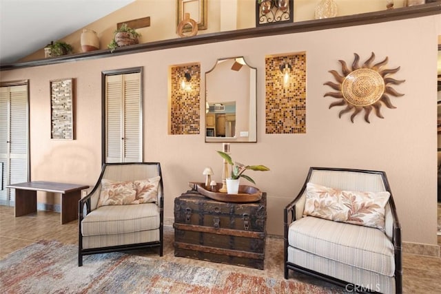 living area with vaulted ceiling