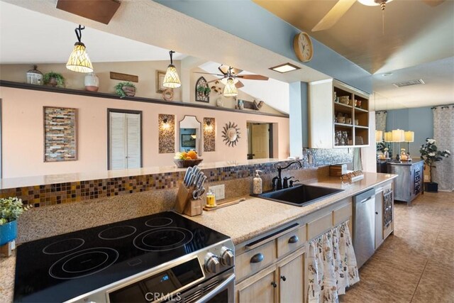 kitchen with sink, stainless steel appliances, decorative light fixtures, vaulted ceiling, and backsplash