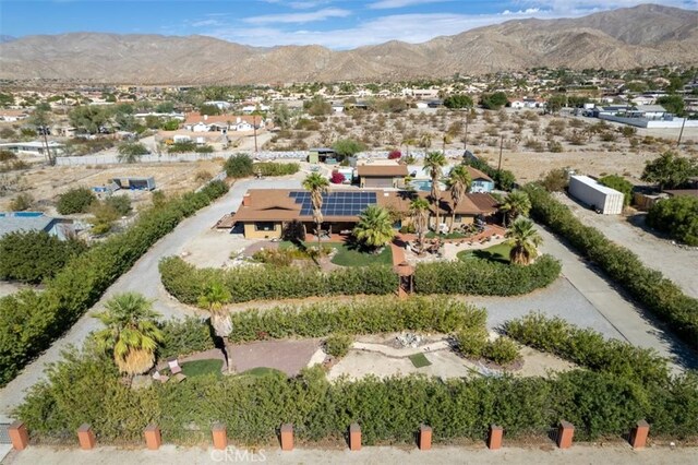 drone / aerial view featuring a mountain view