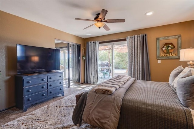 bedroom with ceiling fan, light colored carpet, and access to outside