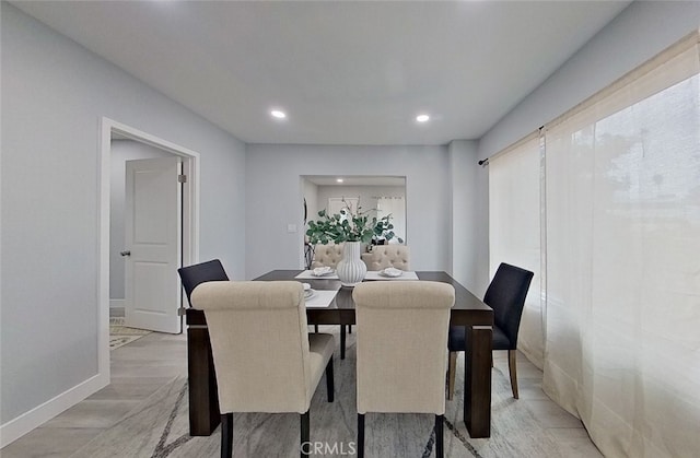 dining area with light wood-type flooring