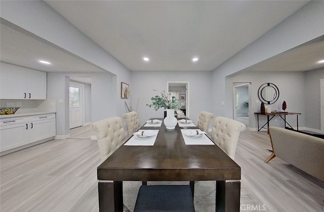 dining area featuring light wood-type flooring