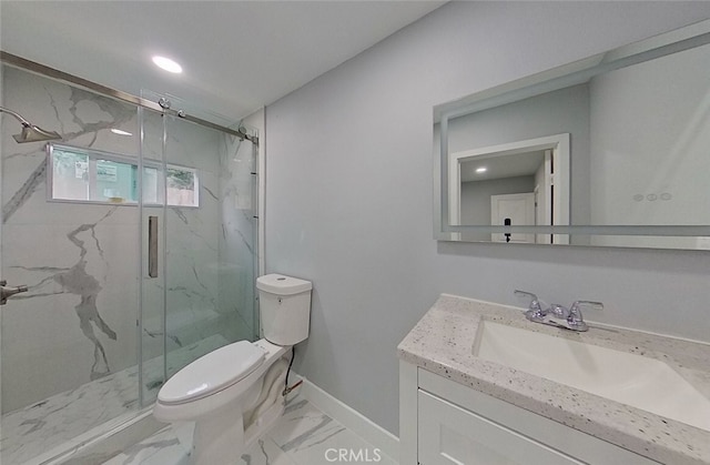 bathroom featuring vanity, toilet, and walk in shower