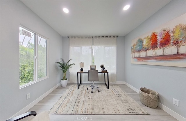 home office featuring hardwood / wood-style flooring and a wealth of natural light