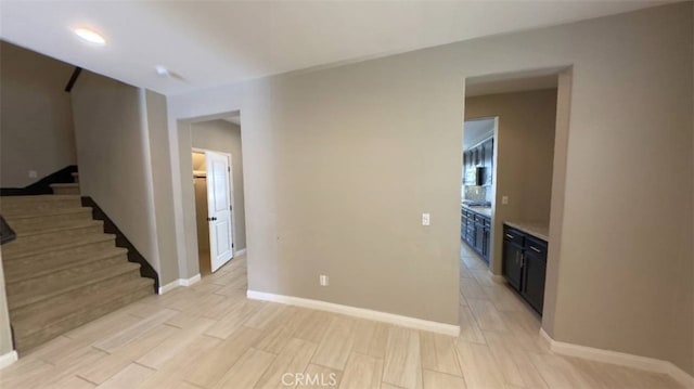 spare room featuring light hardwood / wood-style floors