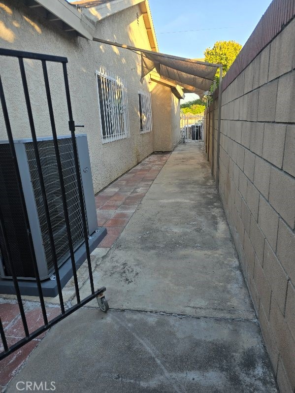 view of home's exterior featuring cooling unit