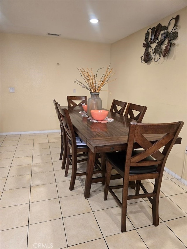 dining room featuring light tile patterned floors