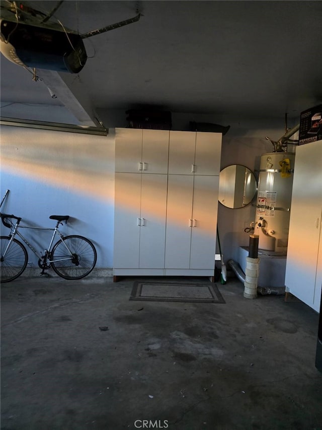 garage with strapped water heater