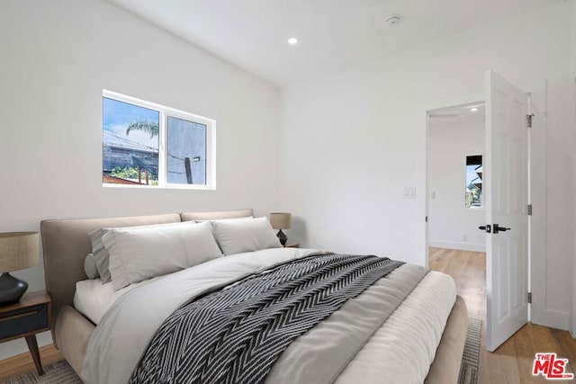 bedroom featuring light wood-type flooring