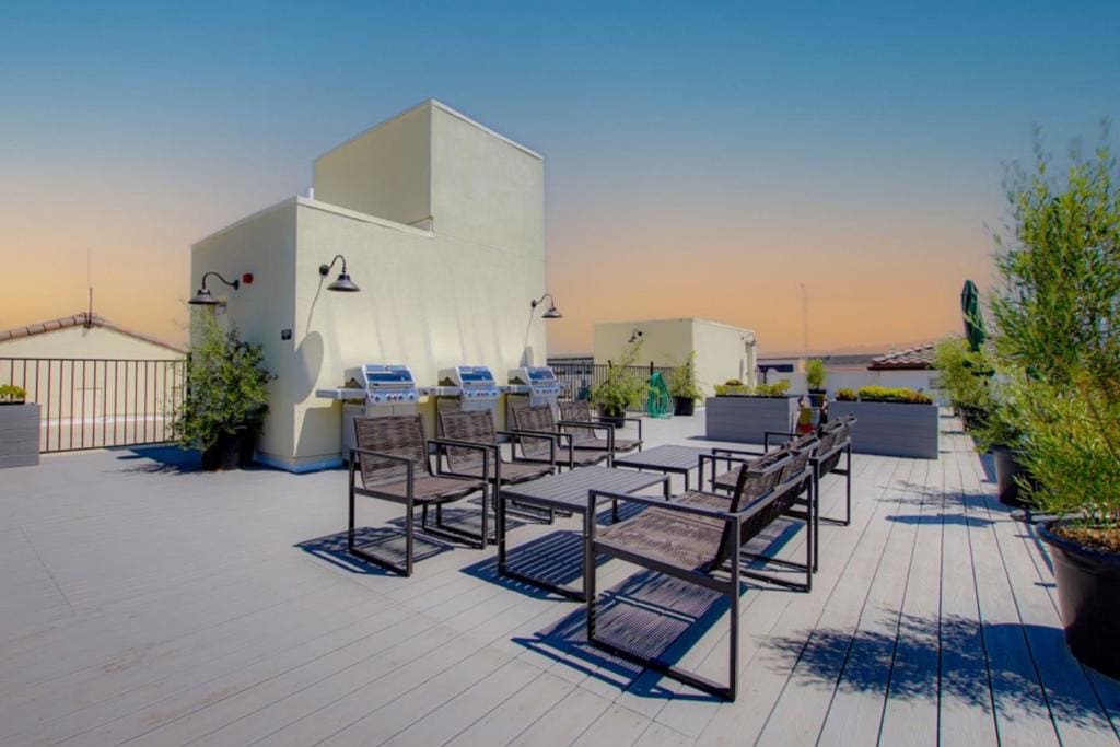 deck at dusk with a patio area