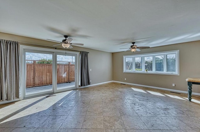 spare room featuring ceiling fan