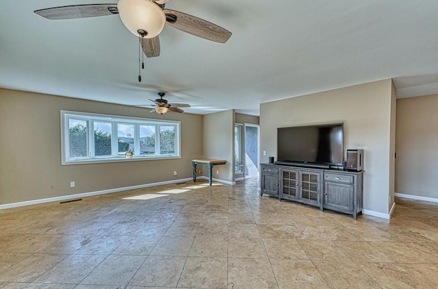 unfurnished living room featuring ceiling fan