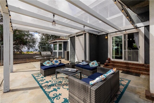 view of patio with an outdoor hangout area and a pergola