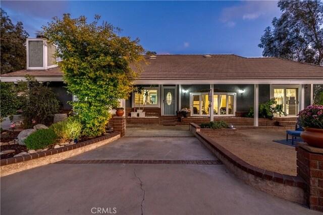 exterior space with a patio area