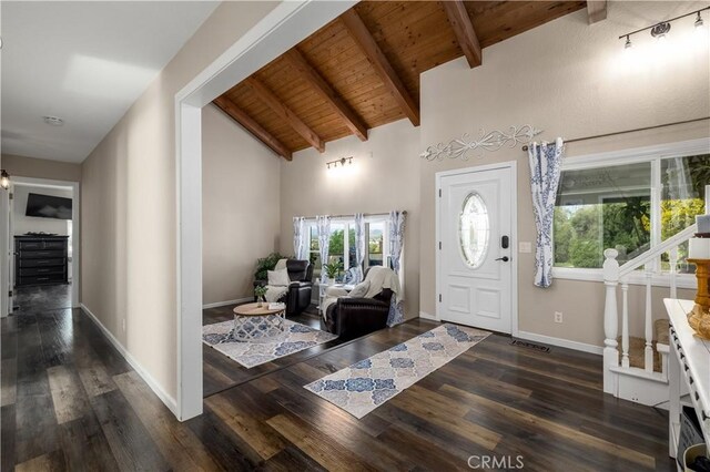 foyer featuring high vaulted ceiling, beamed ceiling, dark hardwood / wood-style flooring, and wood ceiling