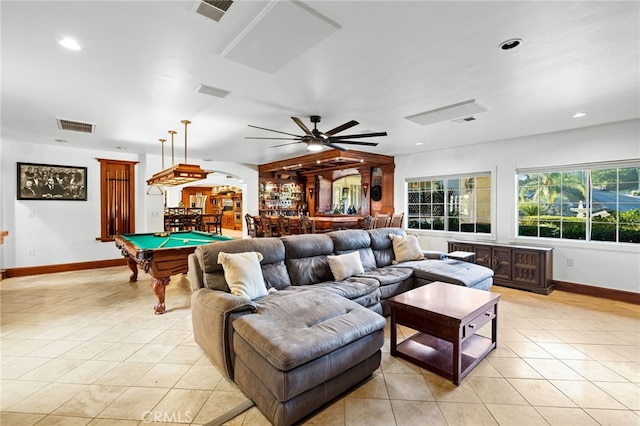 tiled living room with pool table and ceiling fan