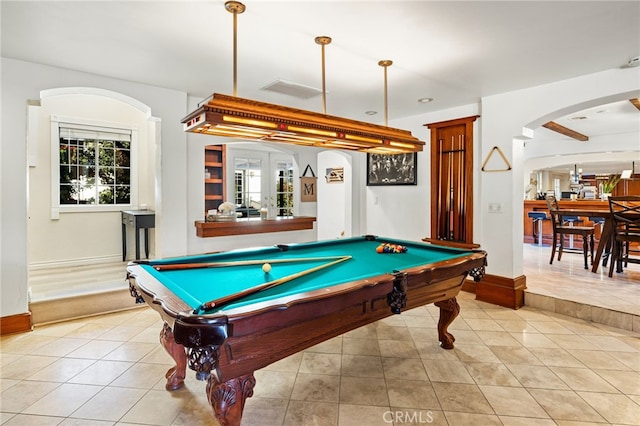 game room featuring a wealth of natural light, light tile patterned flooring, and pool table