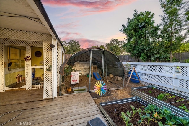 view of deck at dusk