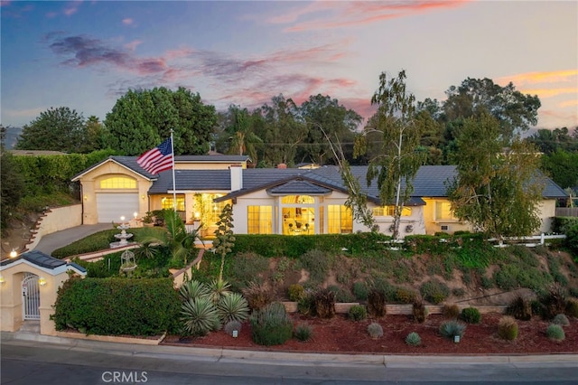 ranch-style home with a garage