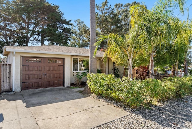 ranch-style home featuring a garage