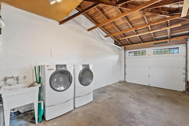 laundry area with independent washer and dryer