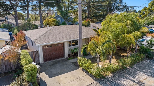 single story home featuring a garage