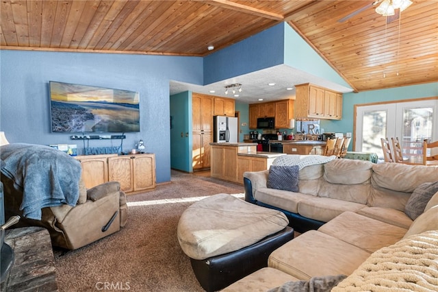 living room featuring wooden ceiling, high vaulted ceiling, french doors, carpet flooring, and beamed ceiling