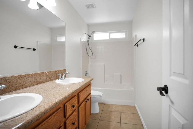 full bathroom featuring bathing tub / shower combination, tile patterned flooring, vanity, and toilet