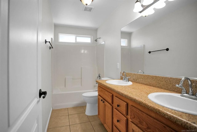 full bathroom with bathing tub / shower combination, tile patterned flooring, vanity, and toilet