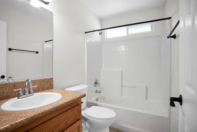 full bathroom featuring vanity,  shower combination, and toilet