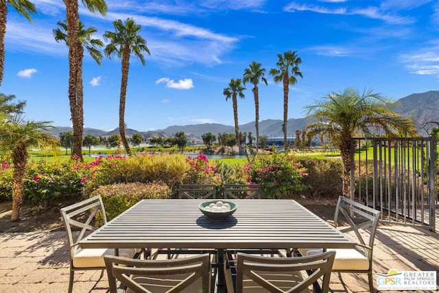 view of patio / terrace with a mountain view