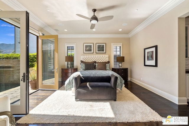 bedroom featuring crown molding, a mountain view, dark hardwood / wood-style floors, and access to outside