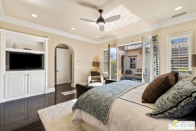 bedroom featuring crown molding, ceiling fan, dark hardwood / wood-style flooring, and access to exterior