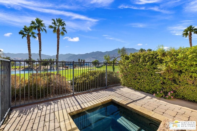 view of pool with a mountain view