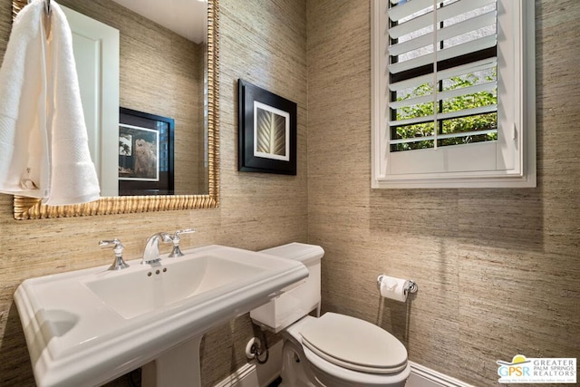 bathroom with toilet and sink