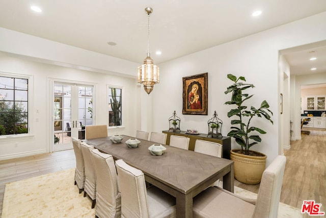 dining area with light hardwood / wood-style flooring