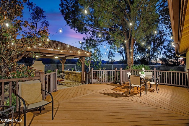 view of deck at dusk