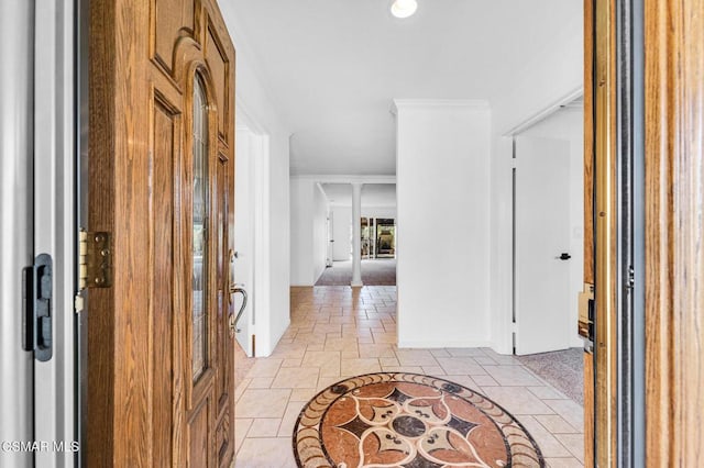 entrance foyer featuring light tile patterned floors