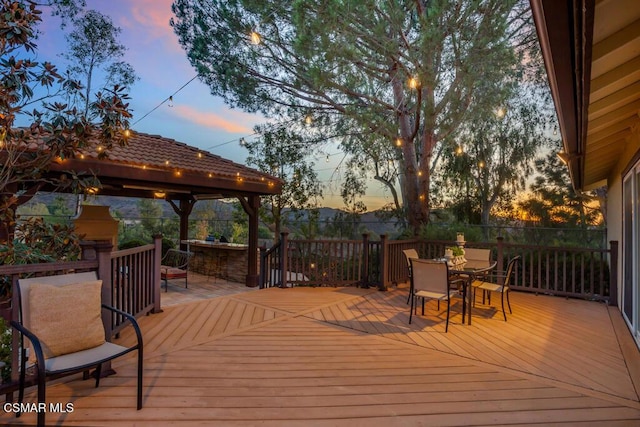 view of deck at dusk