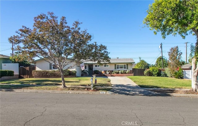 ranch-style house with a front yard