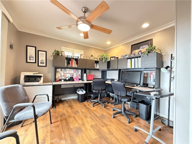 office with crown molding, light wood-type flooring, and ceiling fan