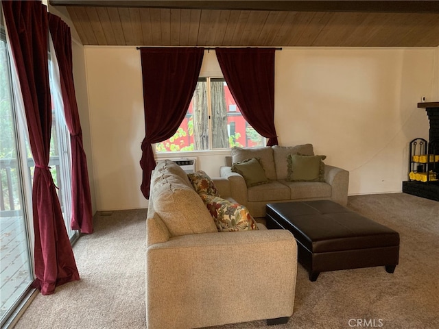 living room featuring a brick fireplace, light colored carpet, wood ceiling, and an AC wall unit