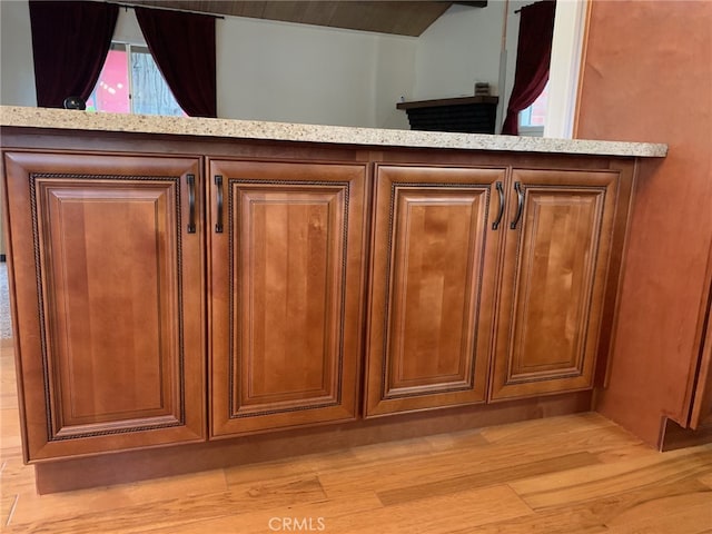 interior details featuring hardwood / wood-style flooring