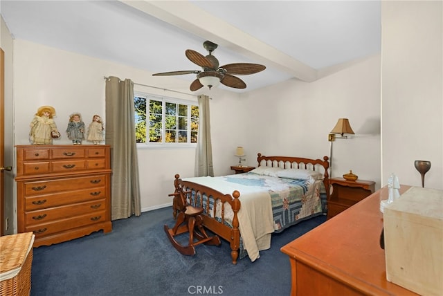 carpeted bedroom featuring ceiling fan and beamed ceiling