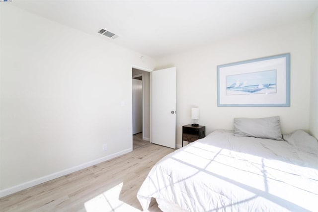 bedroom featuring light hardwood / wood-style floors