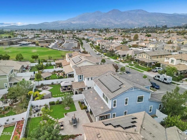 birds eye view of property featuring a mountain view