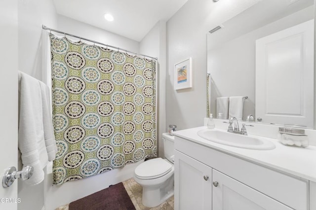 full bathroom featuring vanity, toilet, and shower / bathtub combination with curtain